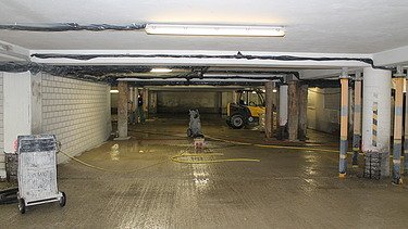Foto von einer abgestützten Tiefgarage nach dem Abtrag des ersten Pilgerschrittes